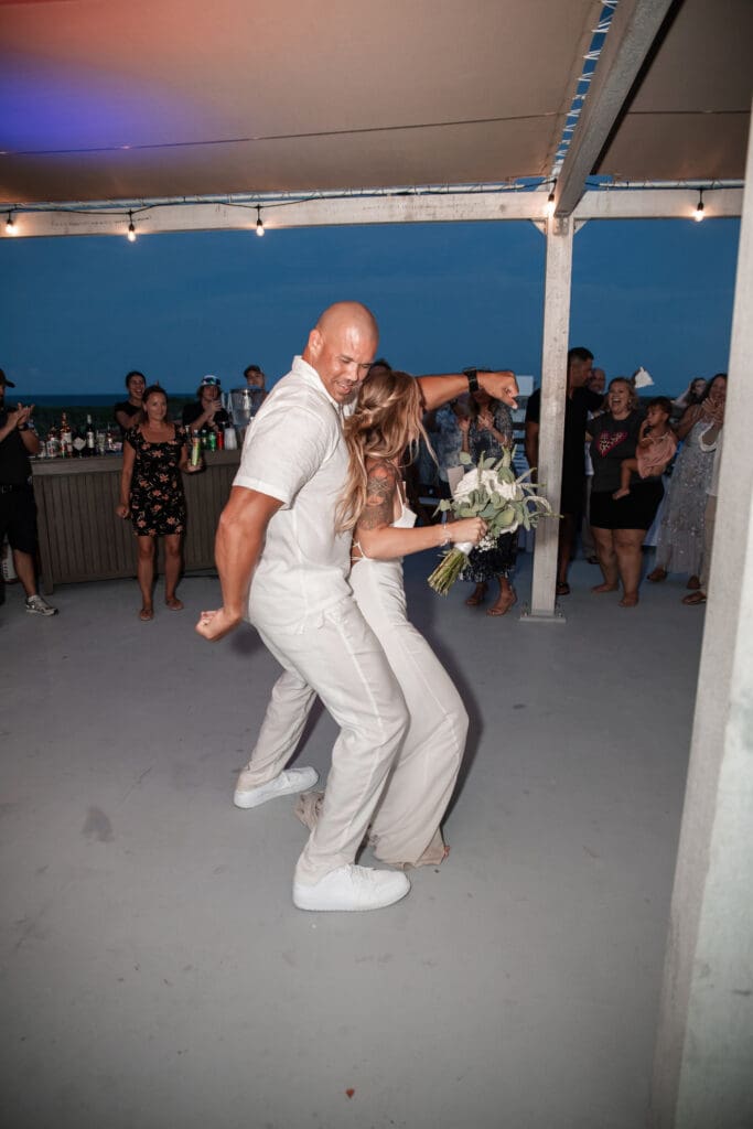 dancing at lively beach wedding