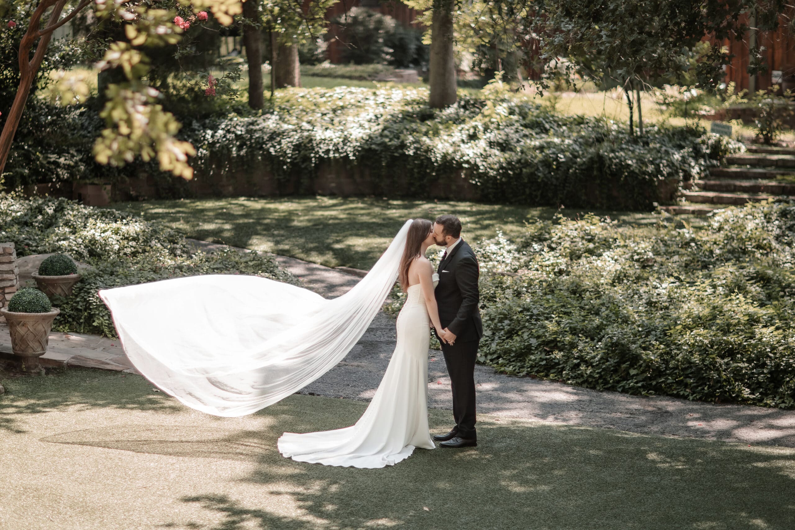 A&M Gardens elopement wedding photography; bride and groom kissing in Azle, Texas.
