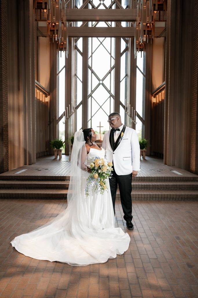 Bride and groom at Marty Leonard Chapel in Fort Worth, TX, one of the best wedding venues in Dallas Fort Worth