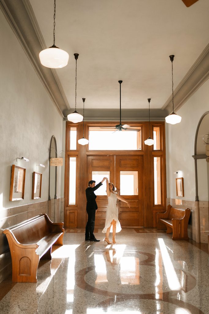 Bride and groom at the Tarrant County Courthouse, one of the best wedding venues in Dallas Fort Worth