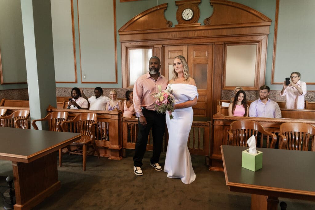 Bride and groom reading their vows to each other during their intimate Fort Worth courthouse wedding.