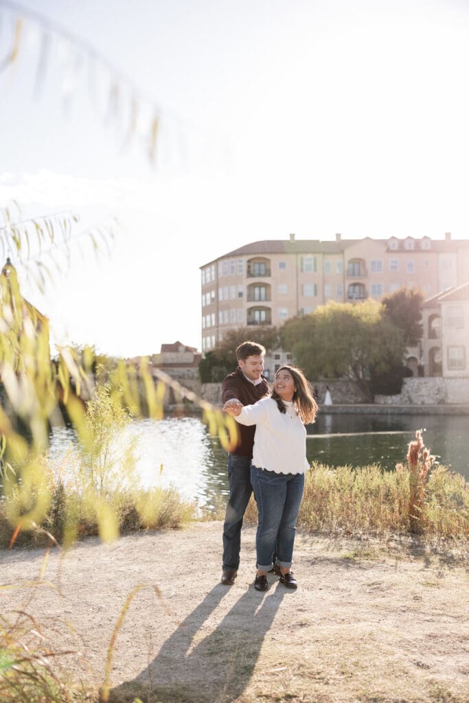Playful couple portraits at Adriatica Village engagement photos session