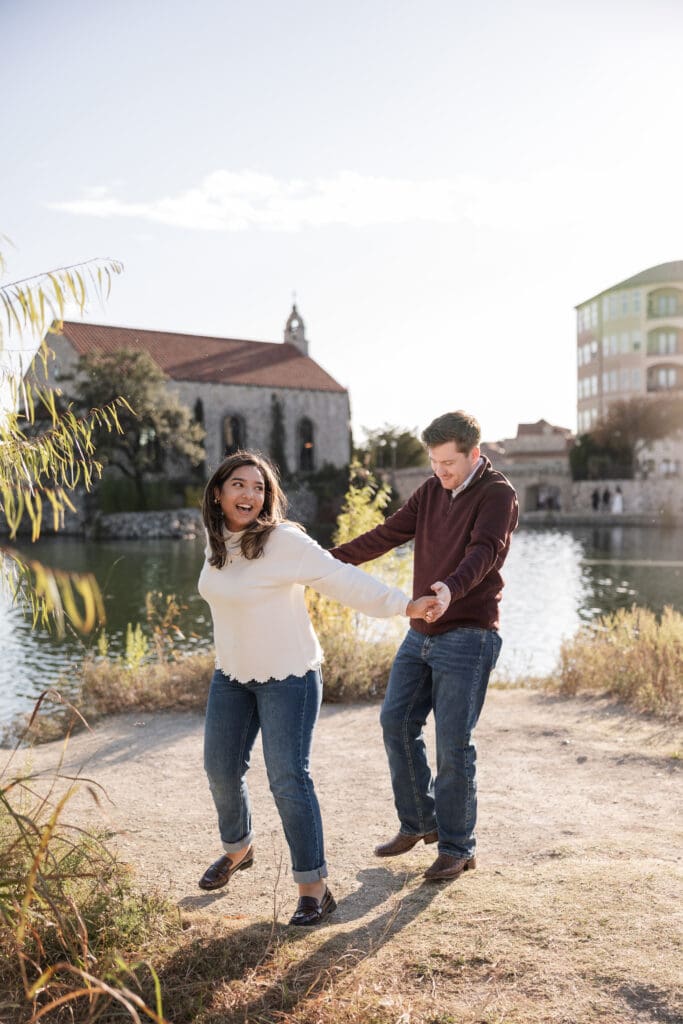 Playful couple portraits at Adriatica Village engagement photos session