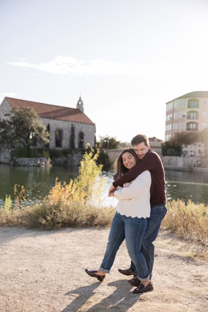 Playful couple portraits at Adriatica Village engagement photos session