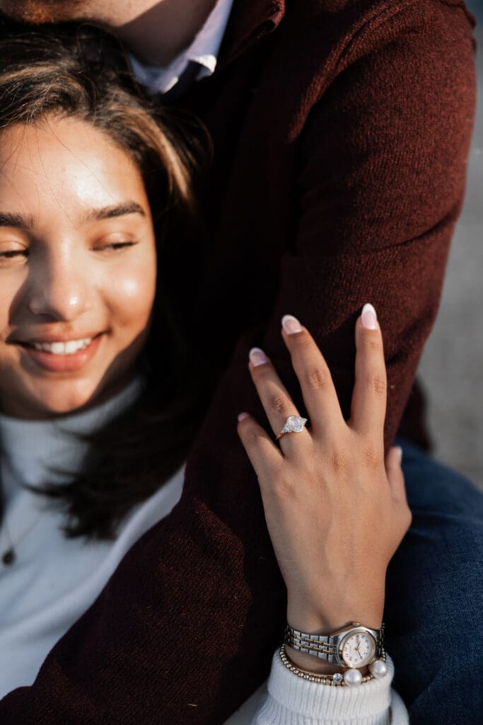 Playful couple portraits at Adriatica Village engagement photos session