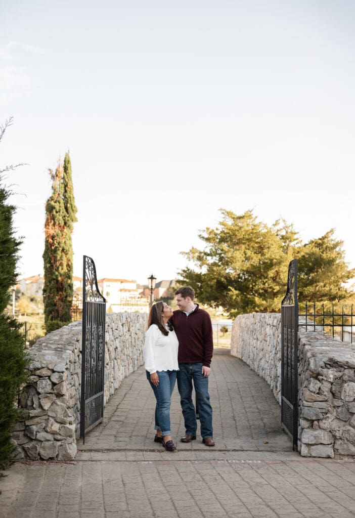 Playful couple portraits at Adriatica Village engagement photos session
