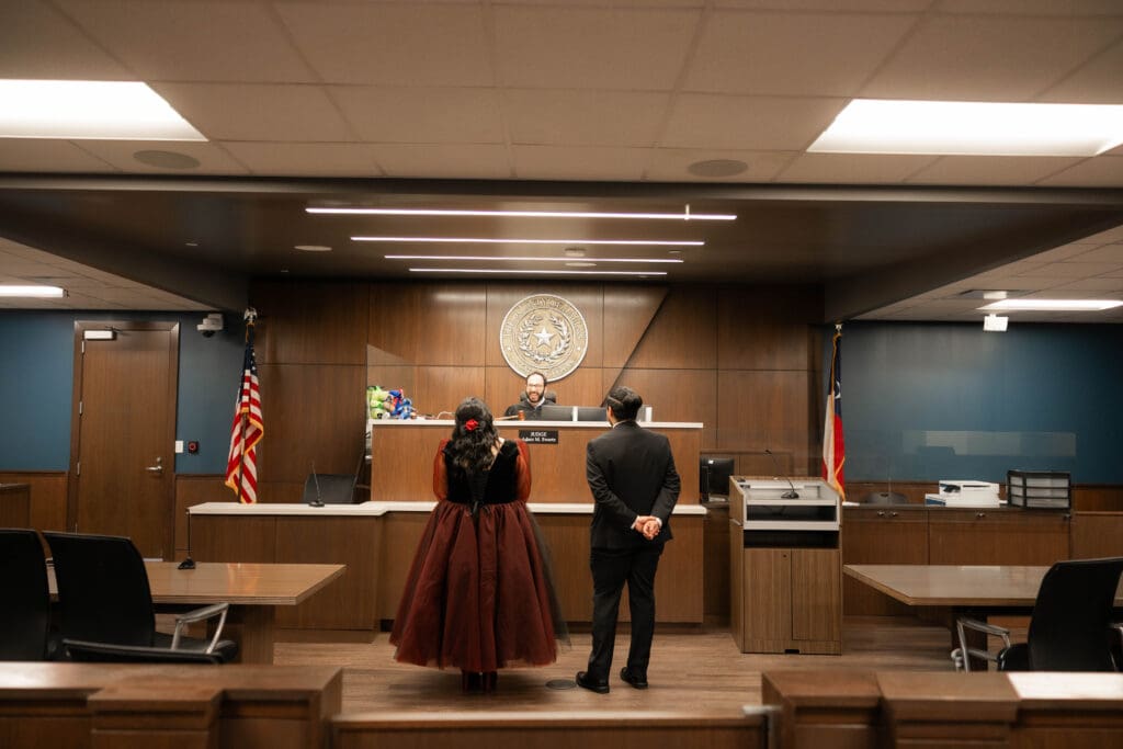 Judge Adam Swartz officiating Esmeralda and Hector’s Dallas courthouse wedding 