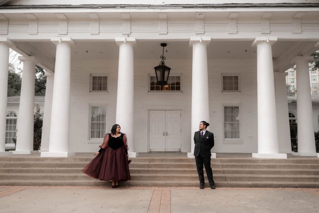 Esmeralda and Hector in front of Arlington Hall at Turtle Creek Park during their Dallas courthouse wedding