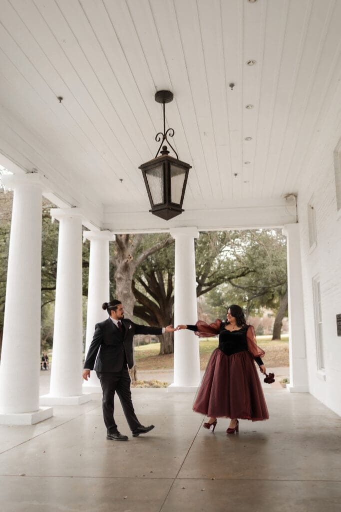 Esmeralda and Hector in front of Arlington Hall at Turtle Creek Park during their Dallas courthouse wedding