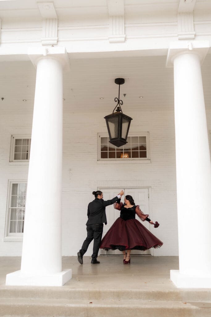 Esmeralda and Hector in front of Arlington Hall at Turtle Creek Park during their Dallas courthouse wedding