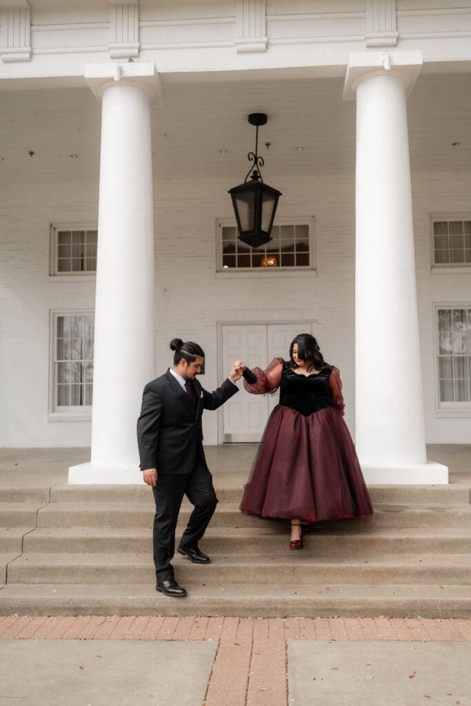 Esmeralda and Hector in front of Arlington Hall at Turtle Creek Park during their Dallas courthouse wedding