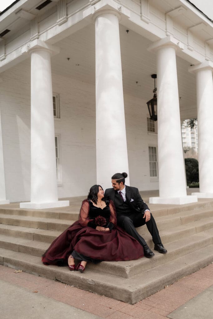 Esmeralda and Hector in front of Arlington Hall at Turtle Creek Park during their Dallas courthouse wedding