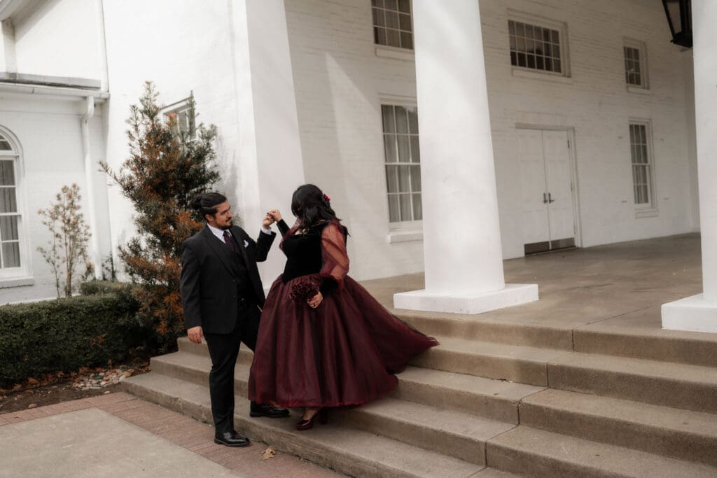 Esmeralda and Hector in front of Arlington Hall at Turtle Creek Park during their Dallas courthouse wedding