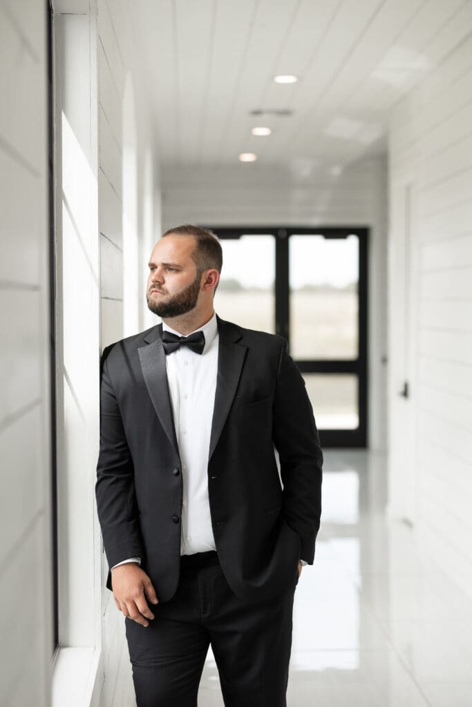 Groom's portraits at The Gardenia Venue in Valley View, TX