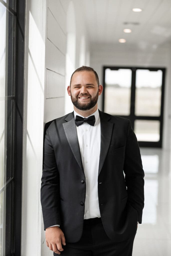 Groom's portraits at The Gardenia Venue in Valley View, TX