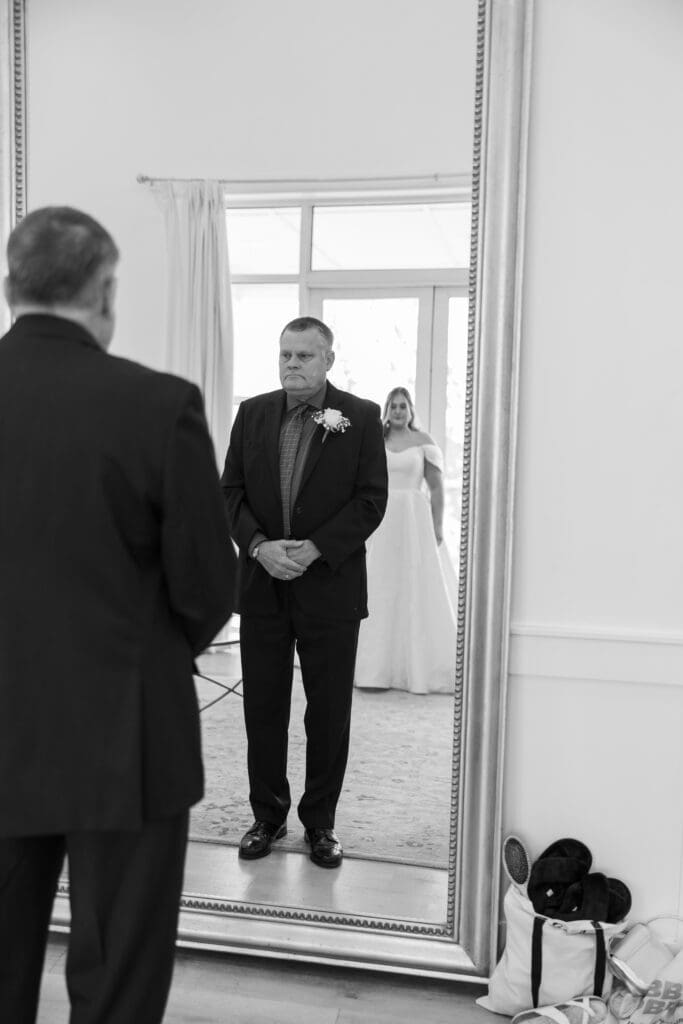 Bride and father sharing an intimate moment at The Gardenia Venue in Valley View, TX