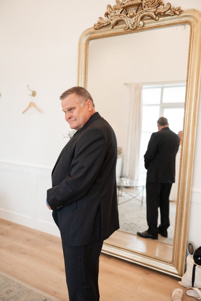 Bride and father sharing an intimate moment at The Gardenia Venue in Valley View, TX