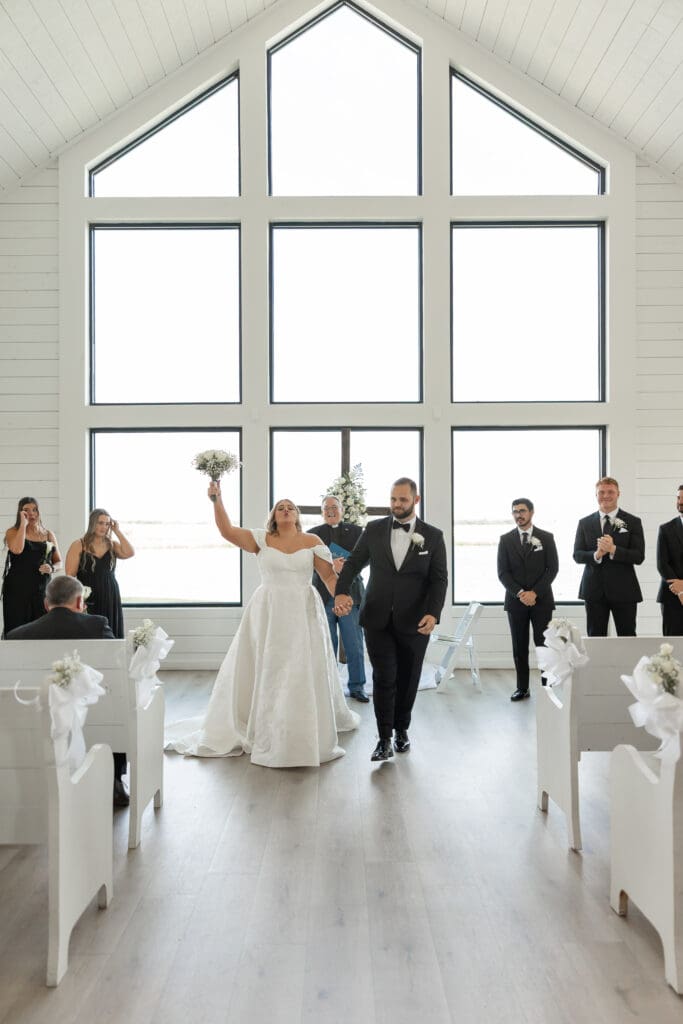 Bride and groom exchanging vows in the chapel at The Gardenia Venue in Valley View, TX
