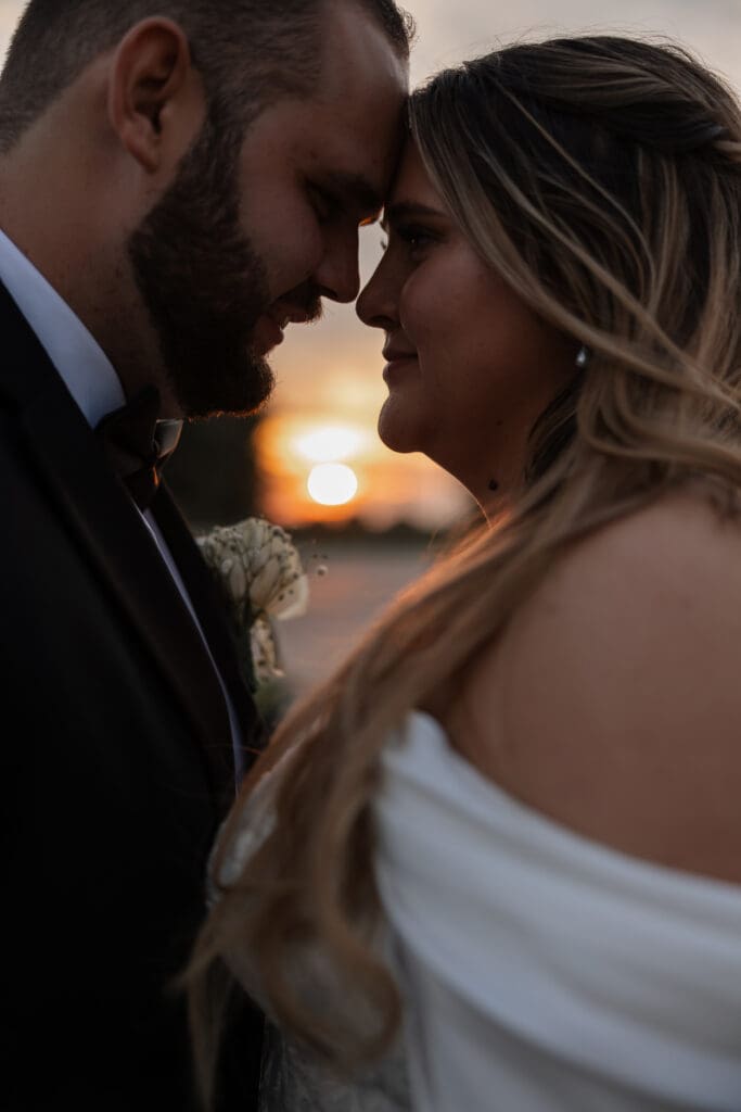 Bride and groom portraits at sunset at The Gardenia Venue in Valley View, TX