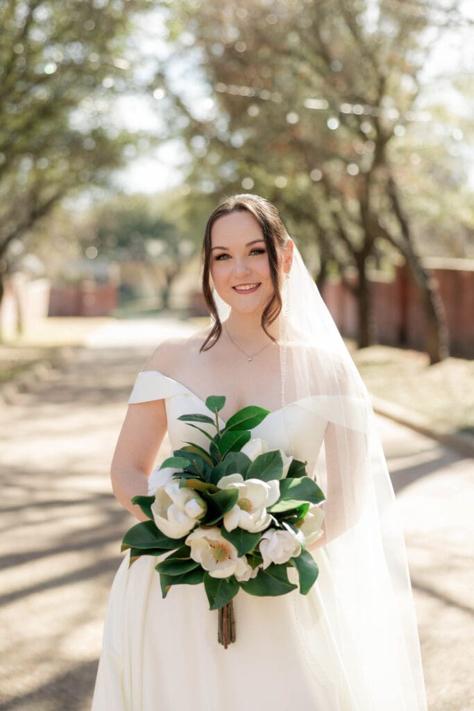 Bridal smiling at Chandor Gardens in Weatherford, TX