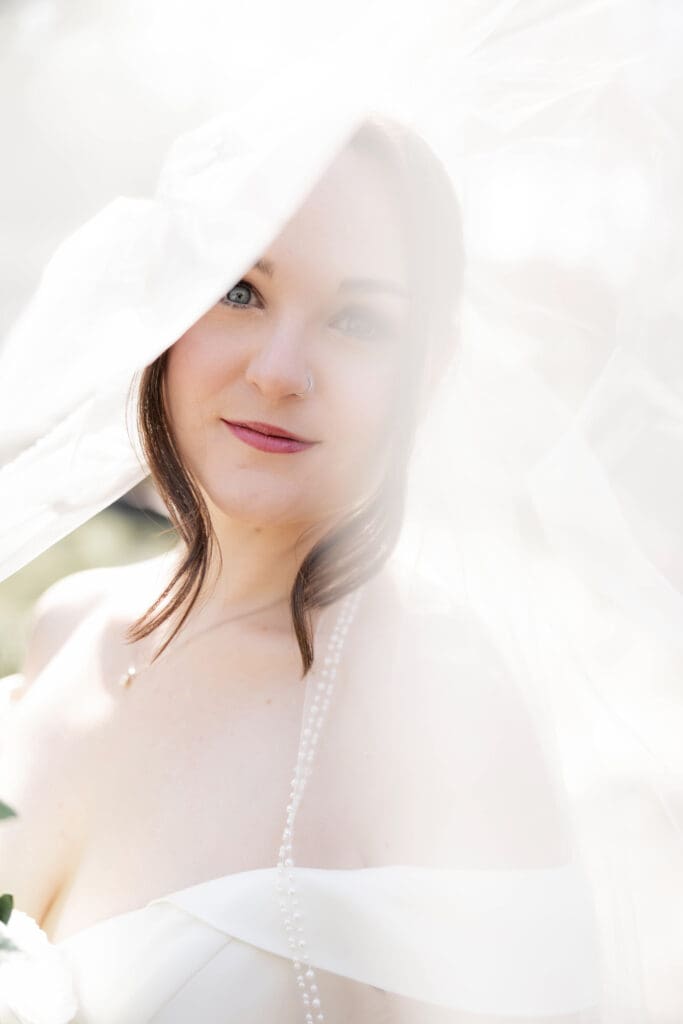 Ethereal photo of bride under veil