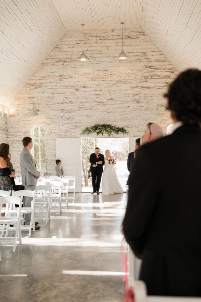 Bride and father walking do the aisle in the chapel at Soli Deo Gloria
