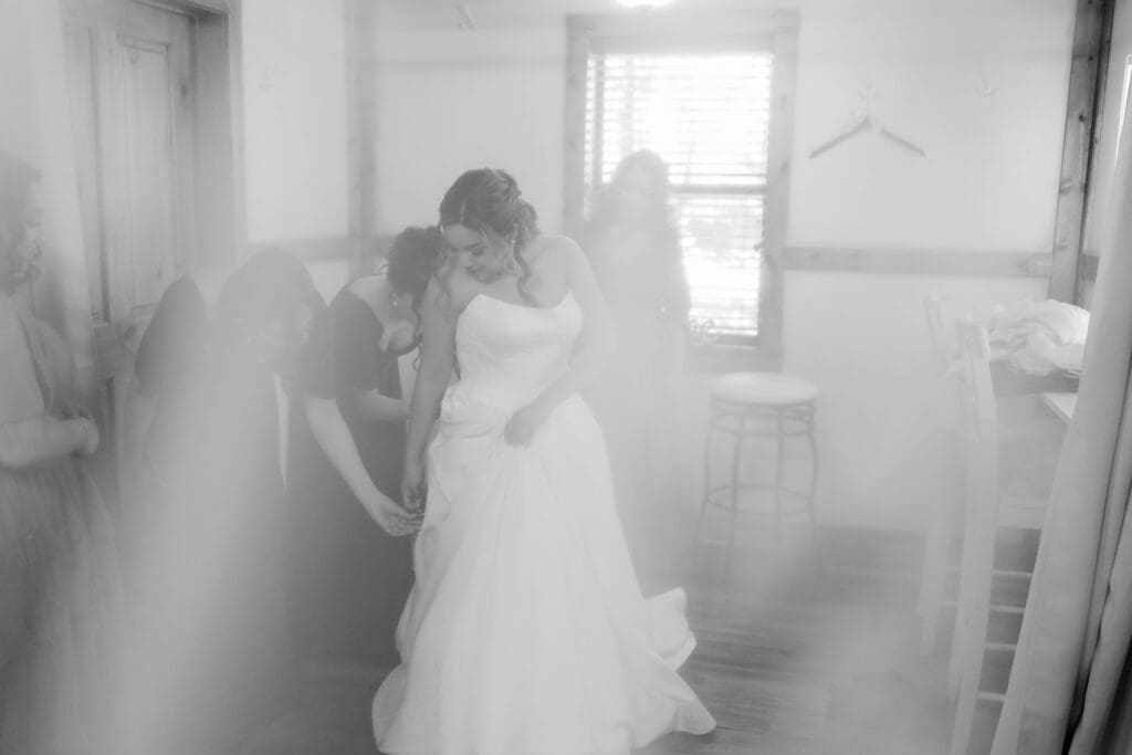 Wedding dress hanging from window