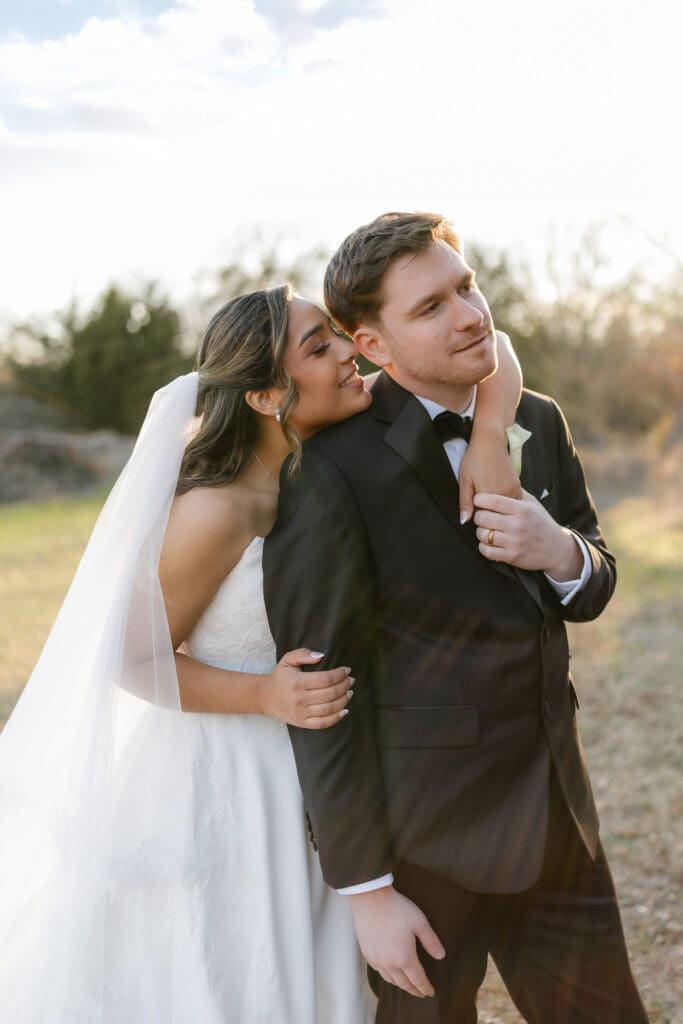 Bride and groom taking golden hour portraits outside at Soli Deo Gloria in Decatur