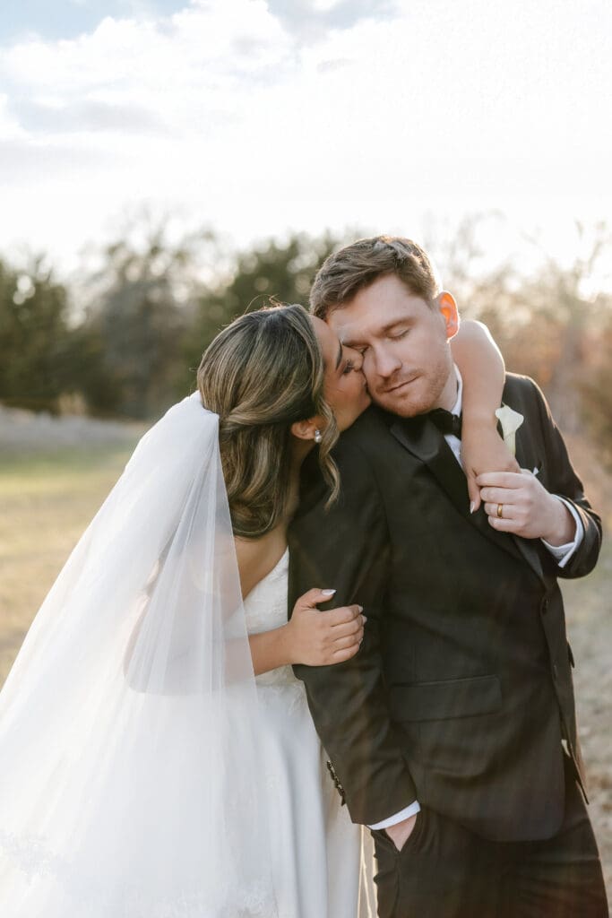 Bride and groom taking golden hour portraits outside at Soli Deo Gloria in Decatur
