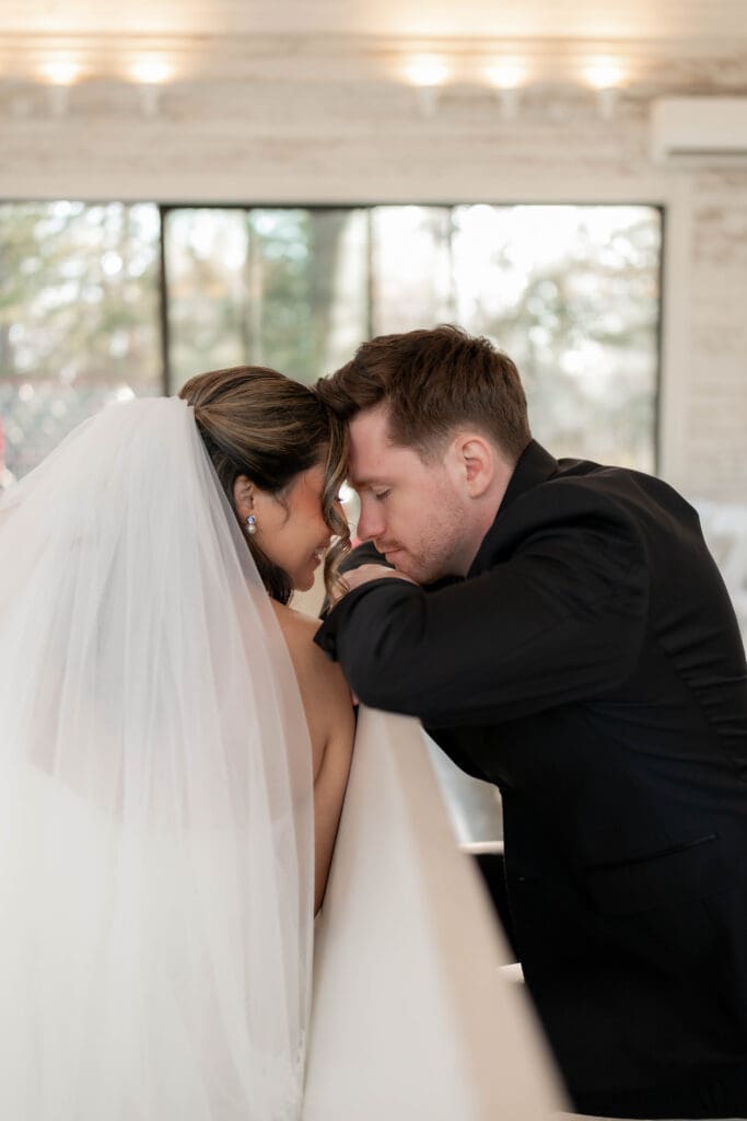 Portraits of bride and groom in the chapel at Soli Deo Gloria weddings and events venue in Decatur