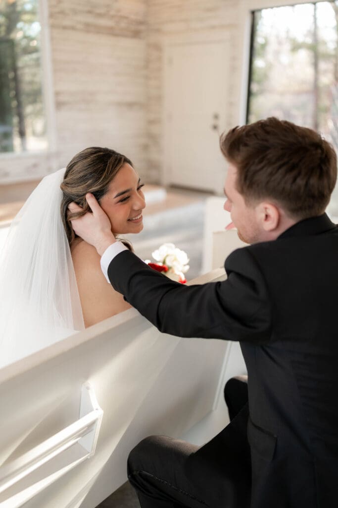 Portraits of bride and groom in the chapel at Soli Deo Gloria weddings and events venue in Decatur