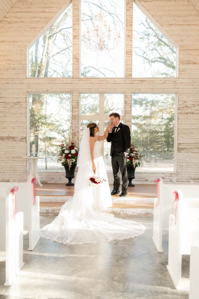 Portraits of bride and groom in the chapel at Soli Deo Gloria weddings and events venue in Decatur