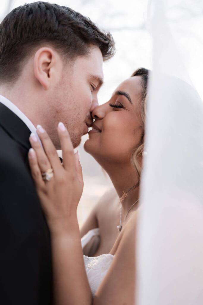 Wedding photography of bride and groom outside with the sun setting behind them in Decatur, TX