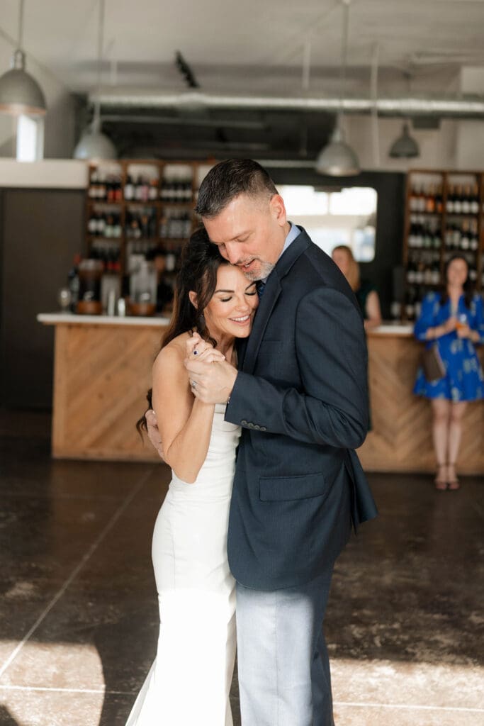 Bride and groom's first dance at Soma Winery in Fort Worth, TX