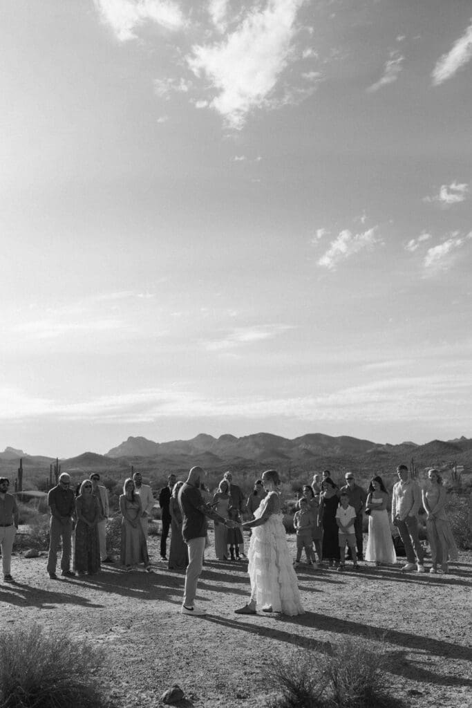 Bride and groom exchanging vows amongst the desert landscape at Lost Dutchman State Park in Arizona