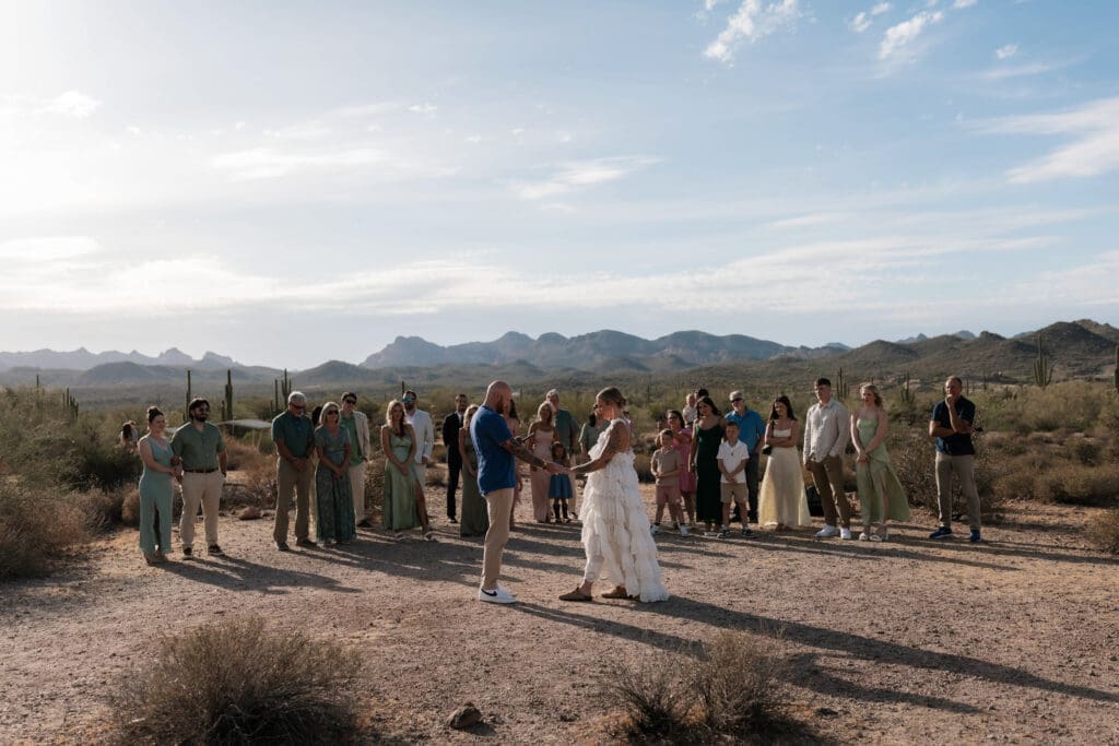 Bride and groom exchanging vows amongst the desert landscape at Lost Dutchman State Park in Arizona