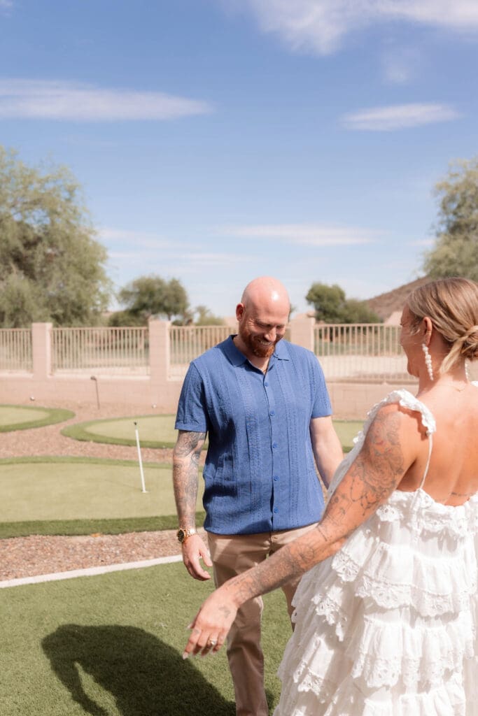 Bride's first look with her groom before their wedding at Lost Dutchman State Park in Arizona