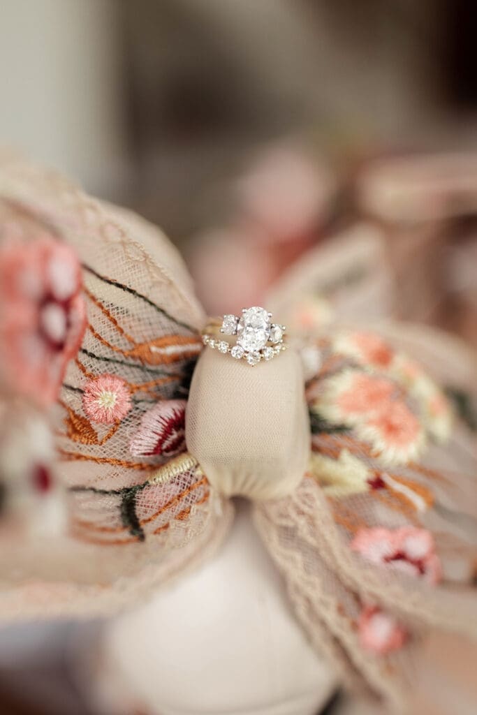 Closeup of wedding rings on bride's heels in Phoenix, Arizona