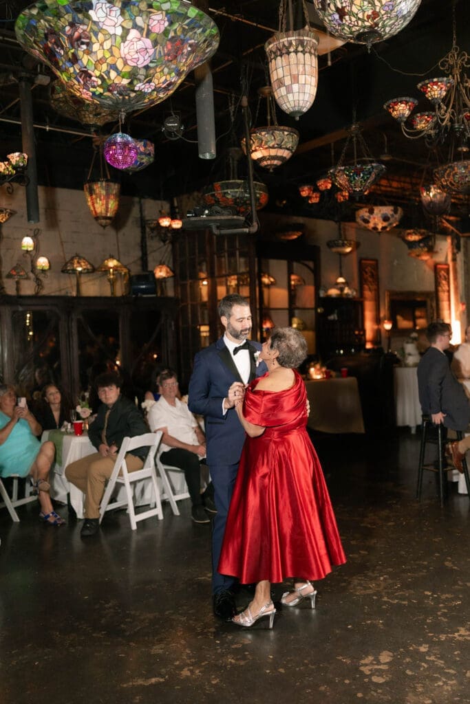 Groom's dance with mother at the Nouveau Antique Bar in Houston, TX