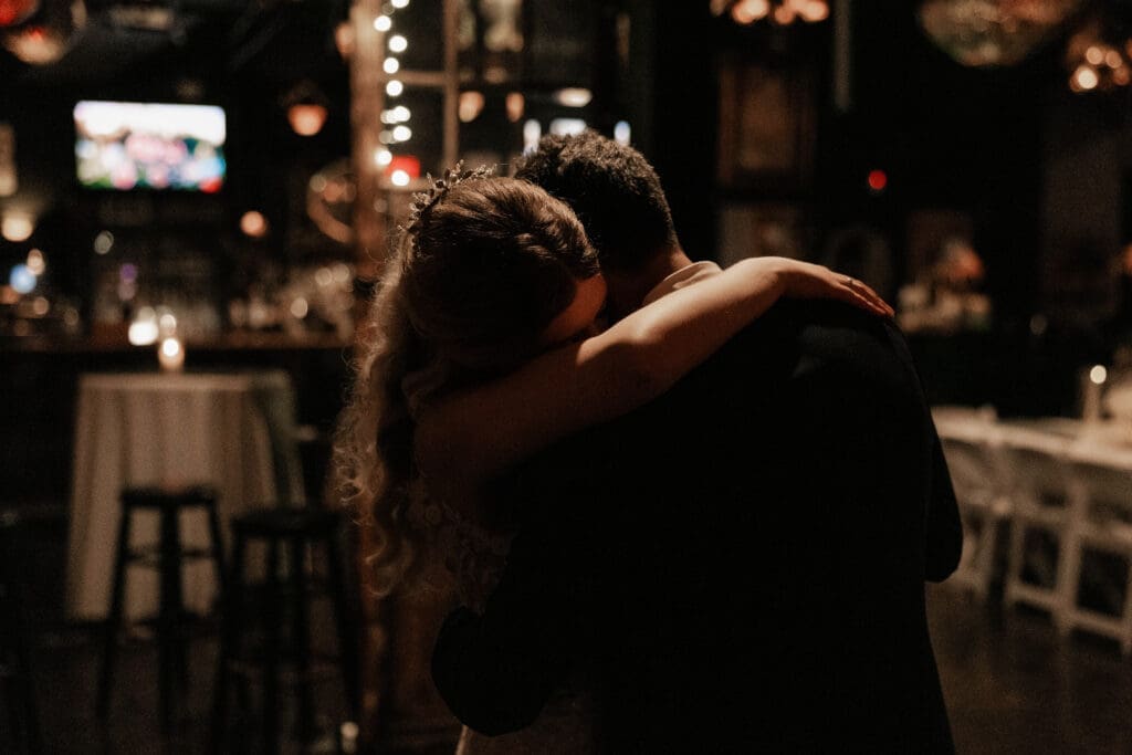 Bride and groom's last dance in an empty Nouveau Antique Art Bar