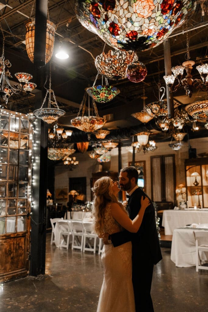 Bride and groom's last dance in an empty Nouveau Antique Art Bar