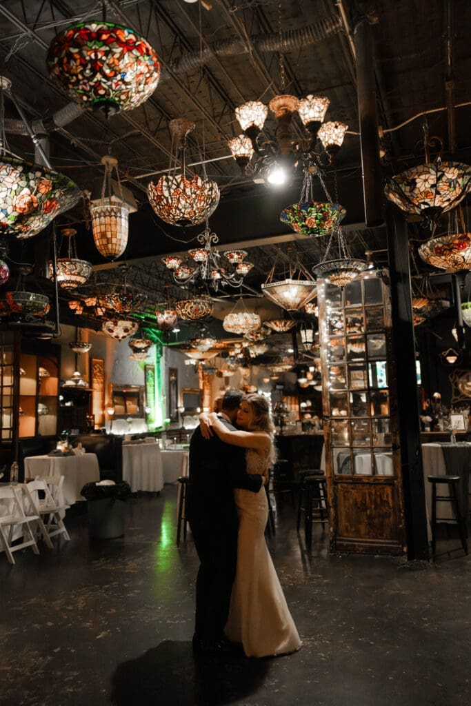 Bride and groom's last dance in an empty Nouveau Antique Art Bar