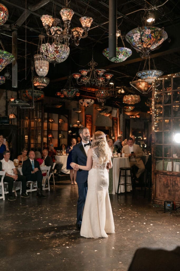 Bride and groom's first dance at the Nouveau Antique Bar in Houston, TX