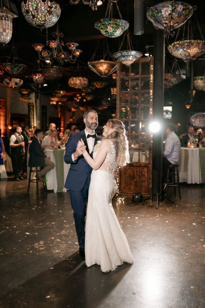 Bride and groom's first dance at the Nouveau Antique Bar in Houston, TX