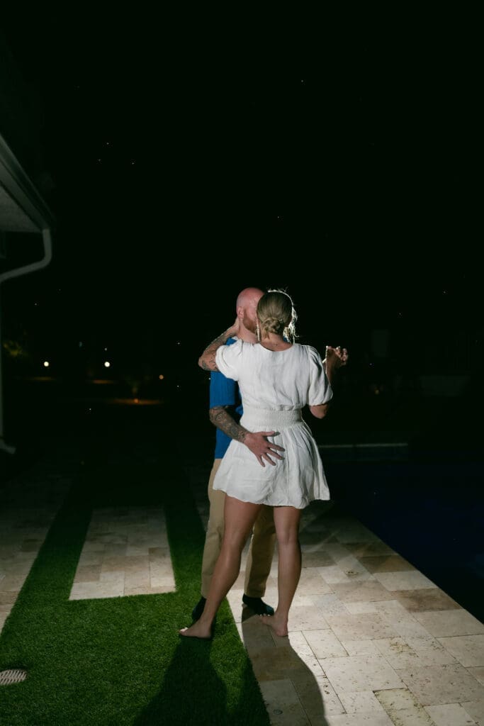Bride and groom's first dance as husband and wife on the back patio of their Airbnb in Phoenix, Arizona