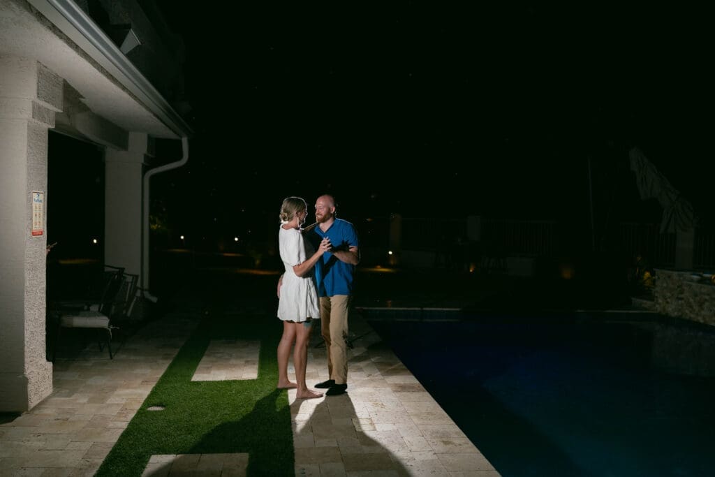 Bride and groom's first dance as husband and wife on the back patio of their Airbnb in Phoenix, Arizona