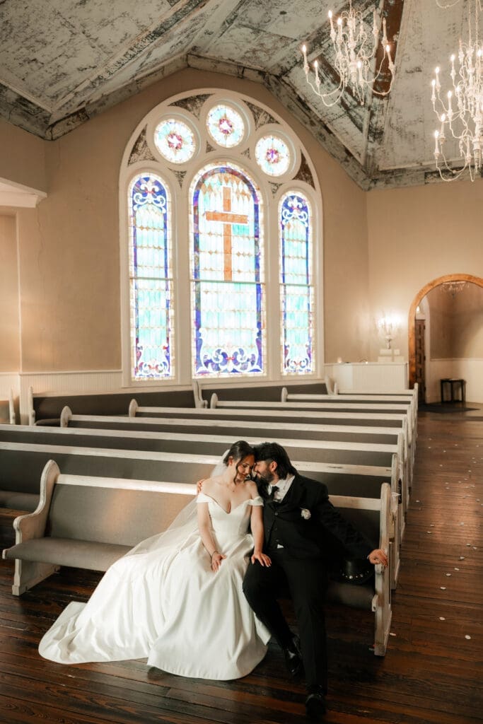 Bride and groom taking wedding portraits at The 1906 wedding venue in Whitesboro, TX