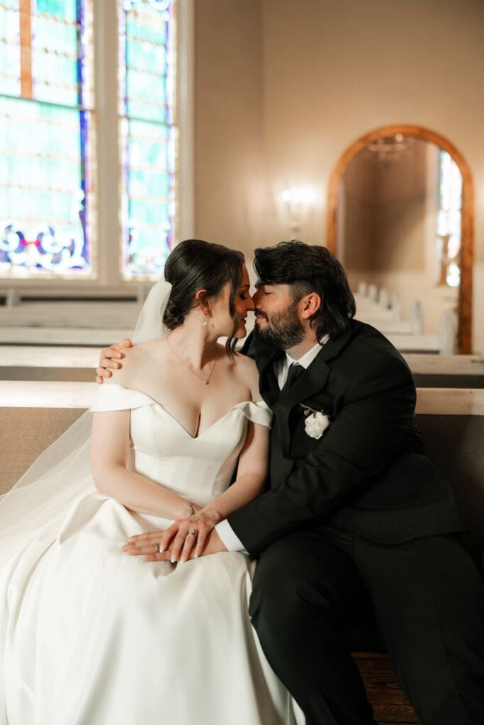 Bride and groom taking wedding portraits at The 1906 wedding venue in Whitesboro, TX
