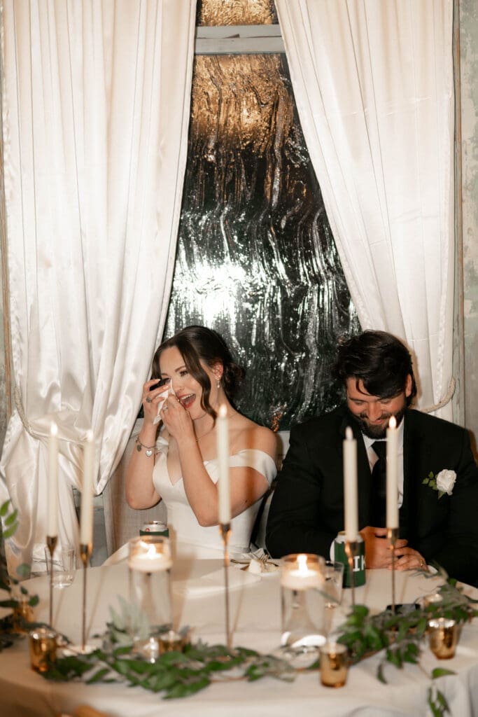 Bride crying during speeches at The 1906 wedding venue in Whitesboro, TX