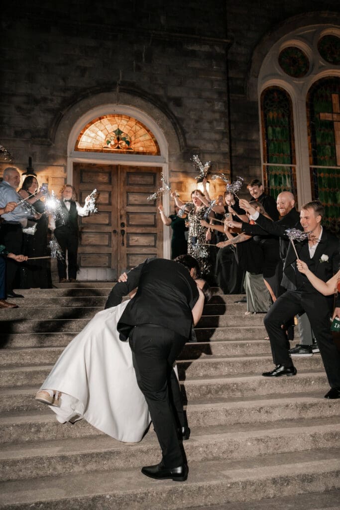 Bride and groom's grand exit with tinsel streamers